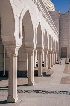 Archs of Beautiful White Mosque in Sunlight.