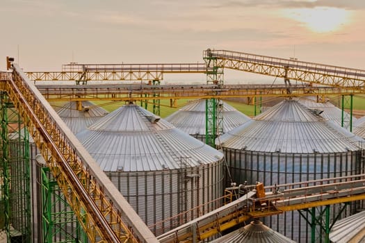 Modern silos for storing grain harvest. Agriculture. Background