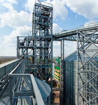 Modern silos for storing grain harvest. Agriculture. Background