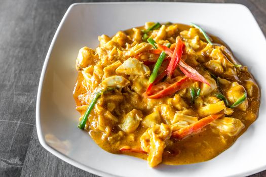 Chili Crab meat fried with curry in Thai style cuisine food