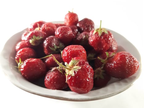 Red ripe strawberries. Photo of useful berries. Vegetarian food. Delicious and healthy dessert, vitamins.