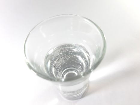 Drink in transparent glass. Liquid pure water in a glass. Photo isolated.