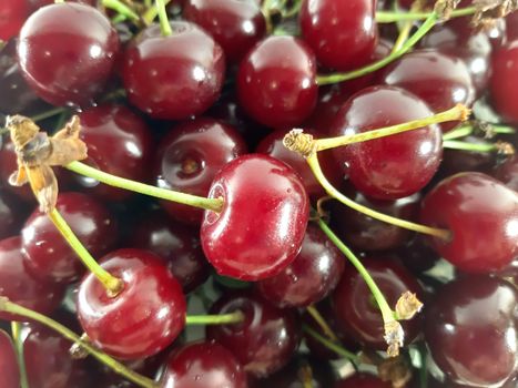Background red cherry . Photo healthy food. Vegetarian red food. Berries and fruits. Berry for snack. 