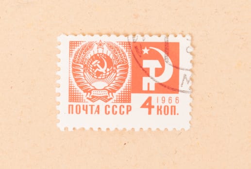CCCP - CIRCA 1966: A stamp printed in the CCCP shows the symbol of the CCCP, circa 1966