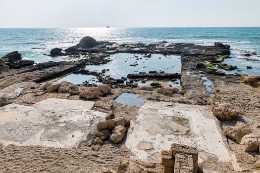 ancient harbor ruins of caesarea in israel with the lower palace remains of king heroes