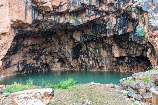 The Grotto of the God Pan 3rd Century BCE filled with water ,Hermon Stream Nature reserve and Archaeological Park ,Banias, Golan Heights Israel