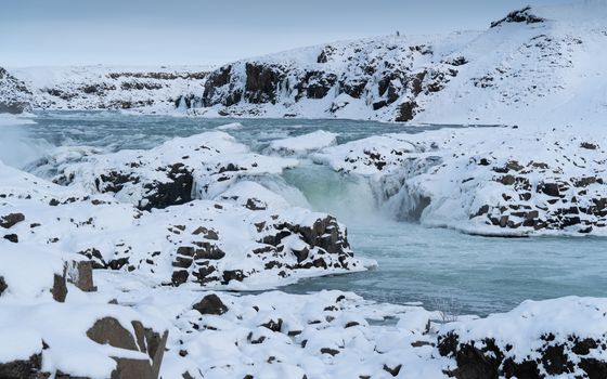 Panoramic image of the frozen waterfall Urridafoss, Iceland, Europe
