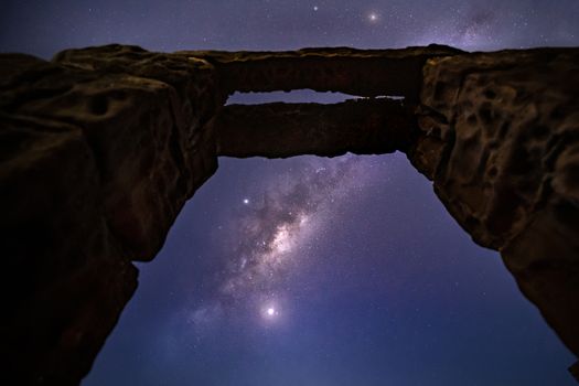 Milky way stars and planets shining brightly like Diamonds over Diamond Bay, Australia