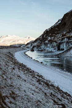 Snaefellsnes peninsula in winter on sunset with iced water in the mountain, Iceland