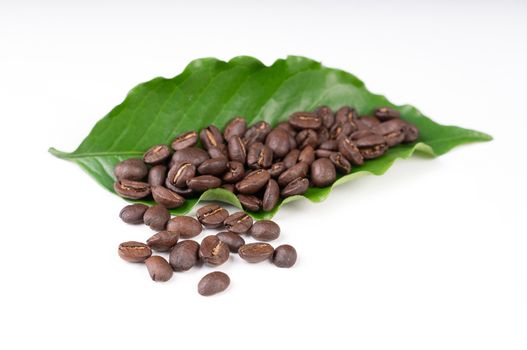 roasted coffee bean with leave isolated on white background