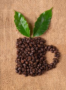 roasted coffee bean with leave on linin sack