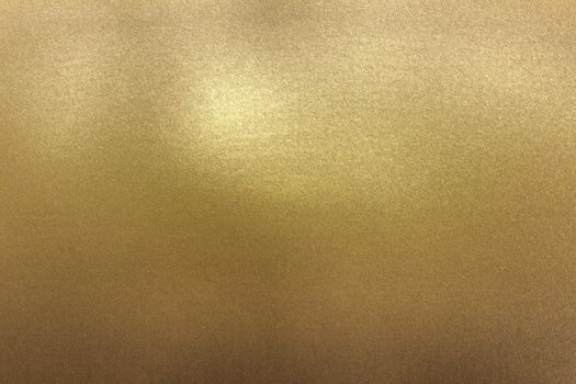 Scratches on gold metal wall, abstract texture background