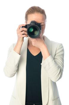 Woman photographer taking images with dslr camera isolated on white background.