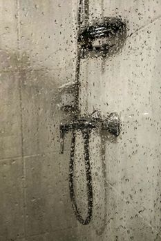 Drops of water on the walls of the shower