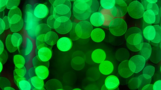 Abstract  green color  with bokeh defocused lights background