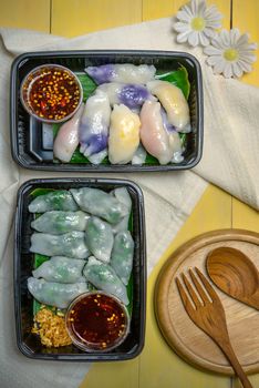 steamed chives dumplings served with spicy chili sauce , asian style cuisine