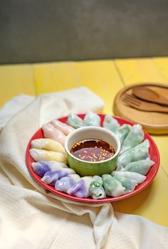 steamed chives dumplings served with spicy chili sauce , asian style cuisine