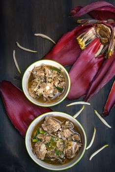 Spicy soup with pork and banana blossom , Thai style food