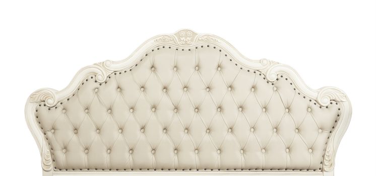 Shaped pastel beige color soft tufted leather capitone bed headboard of Chesterfield style sofa with carved wooden frame, isolated on white background, front view