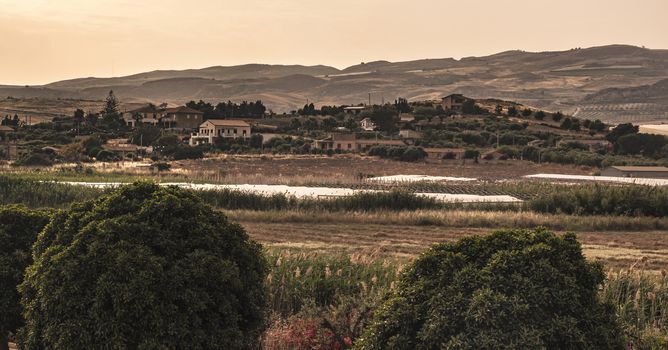 Panorama of the Sicilian hills during sunset in summertime