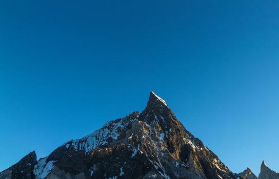 Mitre peak in Karakoram range at sunset view from Concordia camp, K2 K2 Base Camp, Pakistan.