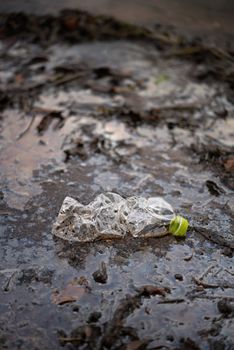 Plastic Scrap pollution in the water , environment protection concepts . Selective focus