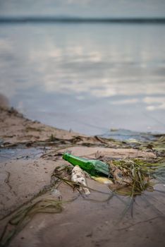 Bottle Scrap pollution in the water , environment protection concepts . Selective focus