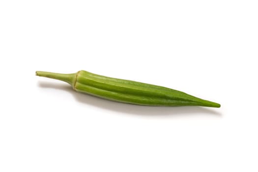 Fresh organic green okra isolated on a white background.