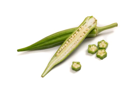 Fresh organic green okra isolated on a white background.