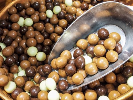 Chocolate balls with scoop background, Brussels, Belgium