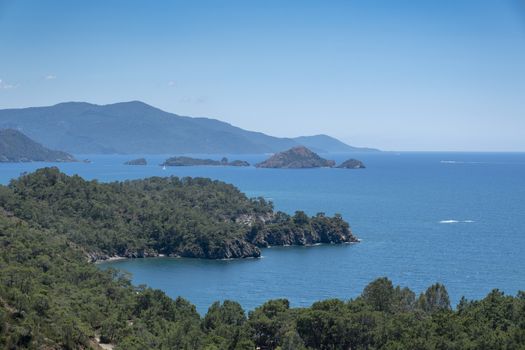 Meditation and fun in nature. Forest and beautiful sea in Mediterranean.