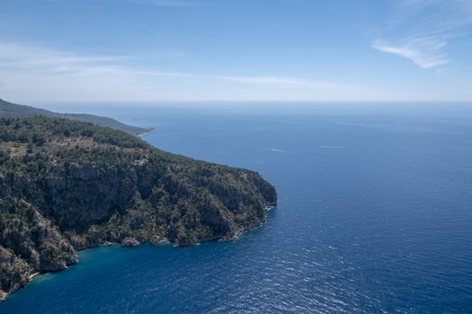 Meditation and fun in nature. Forest and beautiful sea in Mediterranean.