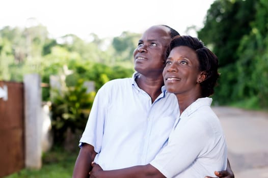 family, travel, happy young couple on holiday in the countryside.