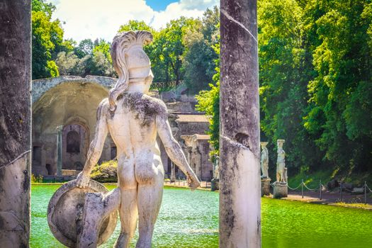 Canopo of Villa Adriana in Tivoli - Lazio - Italy the back of a statue with helmet and shield .