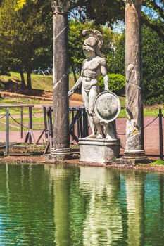 Tivoli - Villa Adriana Canopo - Lazio - Italy statue of roman hero god with helmet and shield .