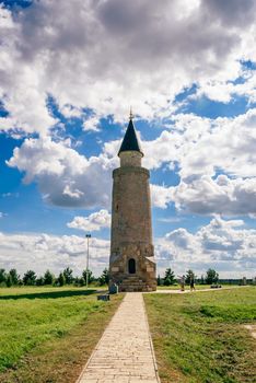 Man Shows His Hand on an Ancient Tower.