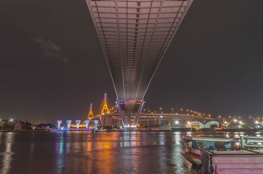 Bhumibol Bridge, Chao Phraya River Bridge. Turn on the lights in many colors at night.