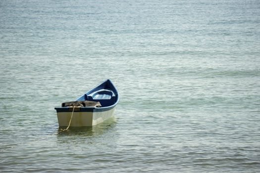 Small boats park by the sea. Small boats near the beach. Sandy beach at Sairee Beach, Chumphon Province