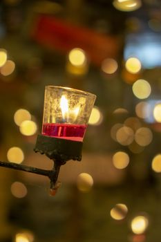 Red candles in clear glass. Candles in glass. Candles decorate in house.	