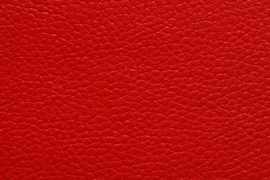 Glowing red leather sheet, abstract pattern texture background