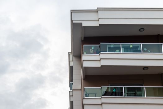 a corner shoot from a modern building with balcony. photo has taken at izmir/turkey.