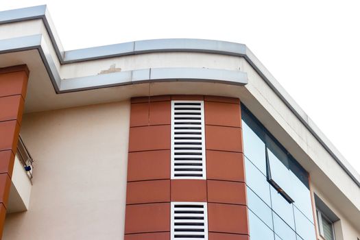 a corner shoot from a modern building with red bricks on it. photo has taken from izmir/turkey.