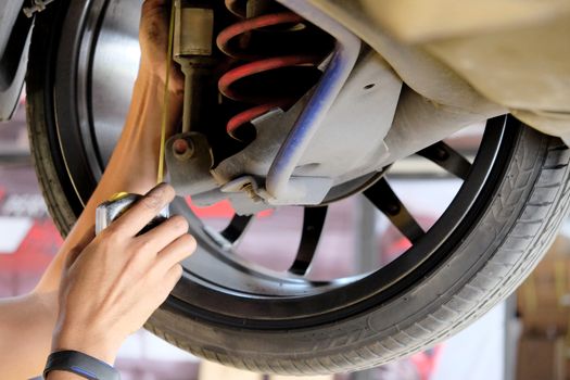mechanic checking the car condition