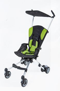 Baby carriage on an isolated studio background