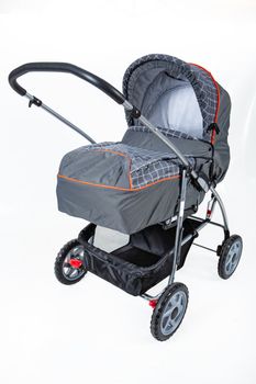 Baby carriage on an isolated studio background