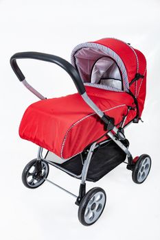 Baby carriage on an isolated studio background