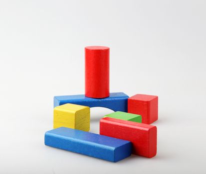 Studio Shot Of Colorful Toy Blocks Against White Background