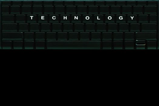 The word “ TECHNOLOGY " on the blank computer keyboard button in darkness background. Top view and copy space for text.