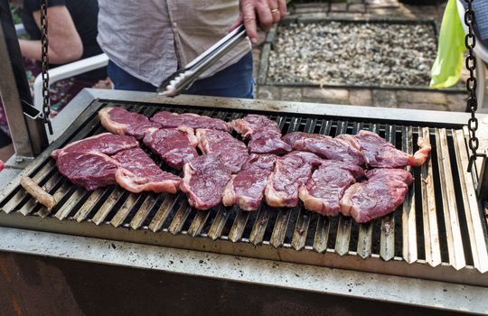 Entrecote Beef Steak On Grill With Rosemary Pepper And Salt