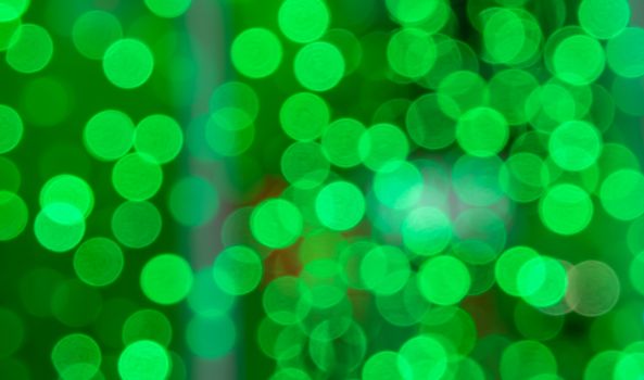 Abstract  green color  with bokeh defocused lights background